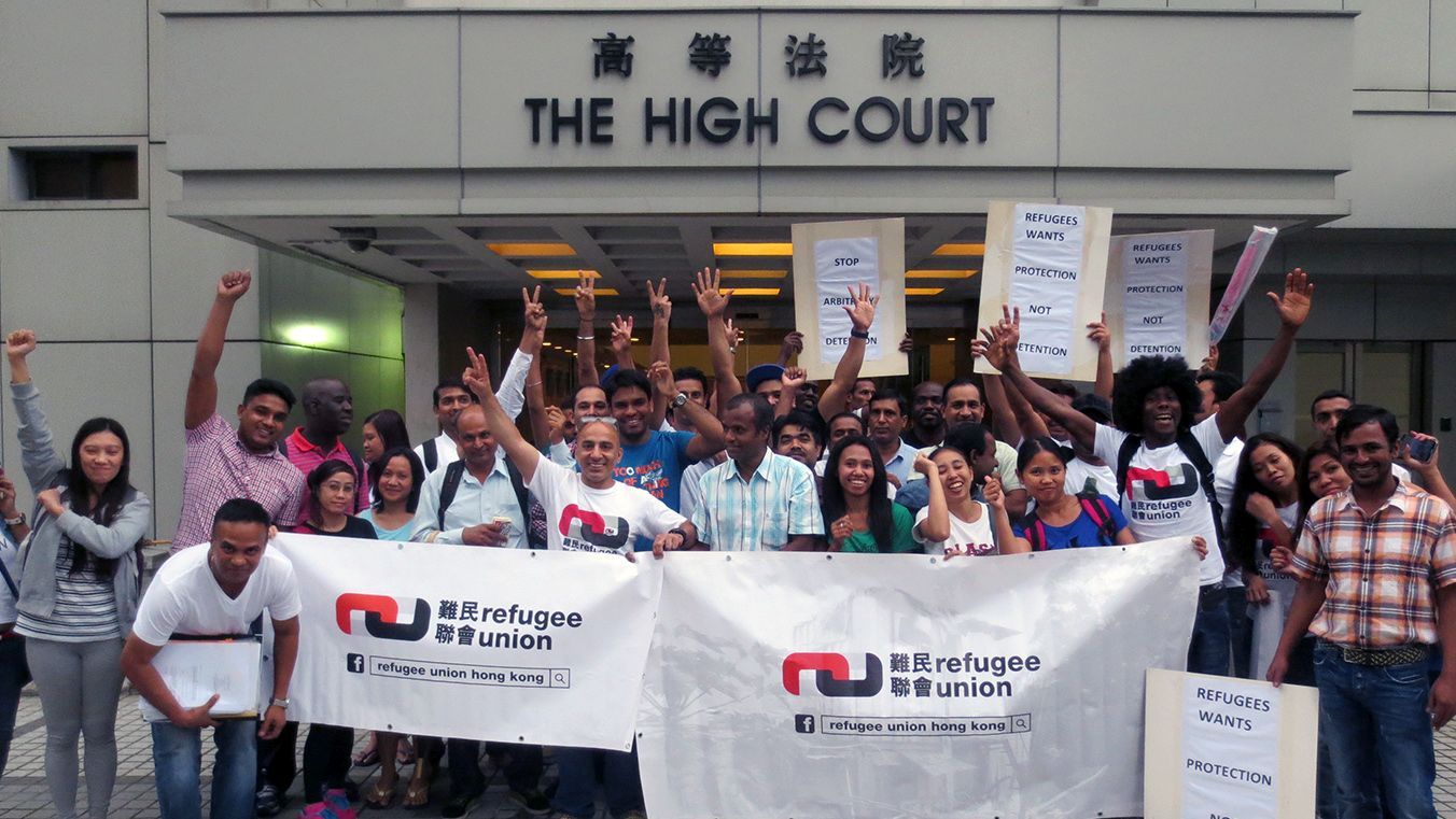 Post injunction hearing photograph outside the High Court in Hong Kong with leaders and members of the Refugee Union (2015)